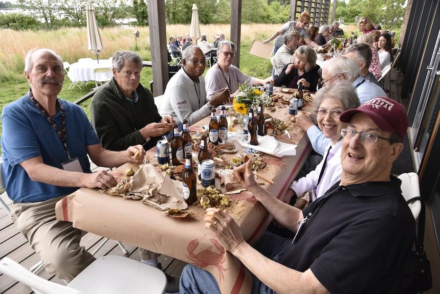 alumni at a picnic table